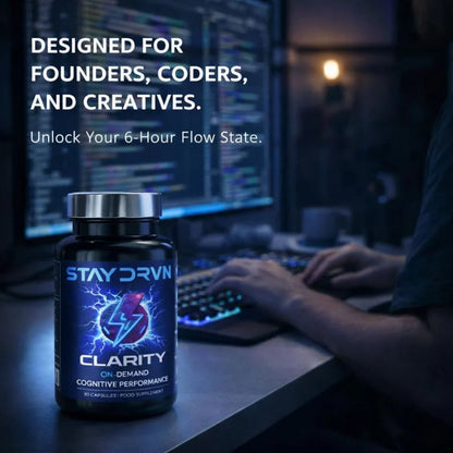 Stay Drvn Clarity supplement bottle on a desk with a person working at a computer, text about founders, coders, and creatives.
